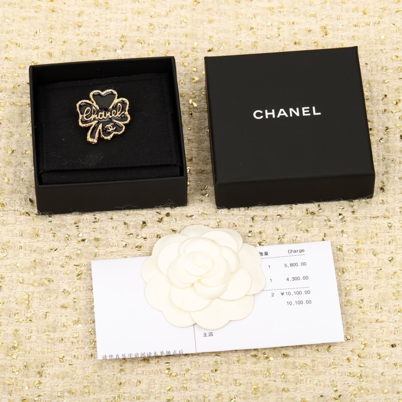 Ch*el brooches